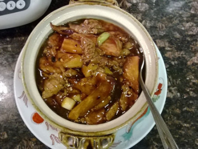 Beef Eggplant Hot Pot: sliced beef, eggplant, and scallions cooked in a brown sauce.