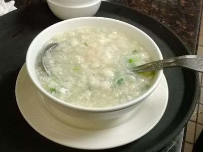 Egg Drop Soup: egg, mushroom, carrots, and bamboo shoots cooked in chicken broth.