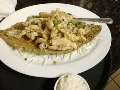 Salted Pepper Flounder: fillets of flounder breaded and deep fried under a bed of cabbage, topped with stir-fried garlic, white onion, salt, and green chili peppers.